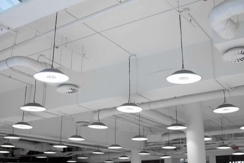Led lighting. Ceiling lights in the mall. Ventilation and water pipes. Fire alarm system