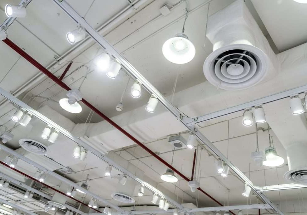 Warehouse ceiling covered in Energy Efficient Lighting