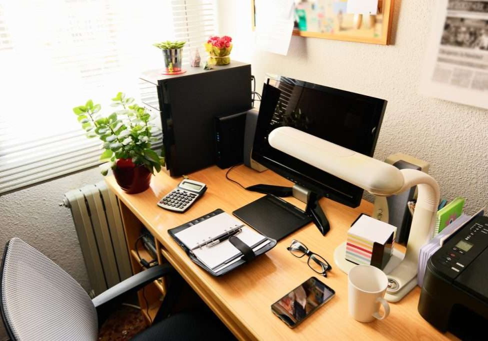 Wide angle of an office to work at home